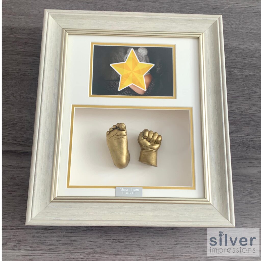 classic frame with hand and foot cast and photo insert